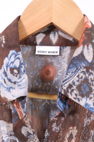 חולצת וינטיג שיפון פרחונית בחום- M-L חולצת וינטיג שיפון פרחונית בחום- M-L