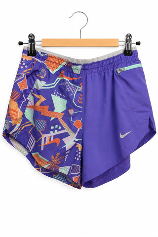 שורט ספורטיבי NIKE בסגול- S-M