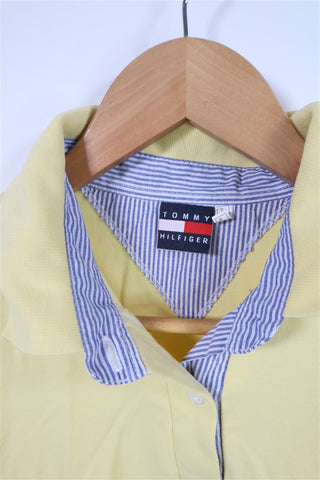 חולצה פולוTOMMY HILFIGER בצהוב- XS-M