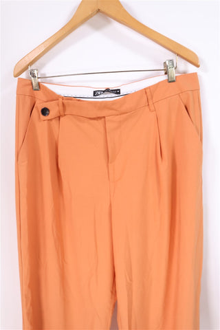 מכנסיים מתרחבים ZARA בכתום- XL