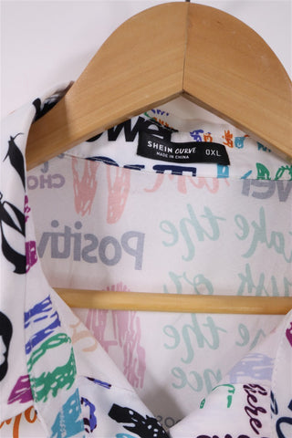 חולצה מכופתרת מקושקשת בלבן- L-XL