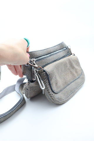 תיק עור מעוצב ומנצנץ במוקה-OS