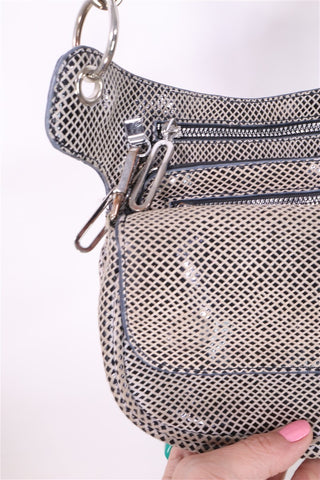 תיק עור מעוצב ומנצנץ במוקה-OS