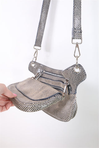 תיק עור מעוצב ומנצנץ במוקה-OS