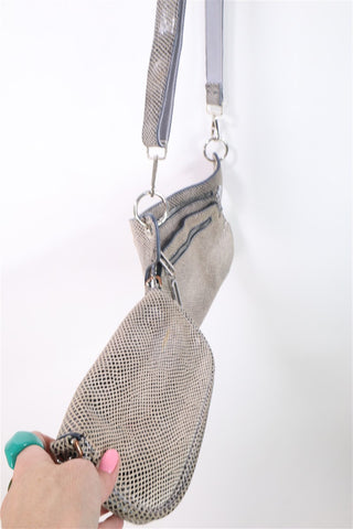 תיק עור מעוצב ומנצנץ במוקה-OS