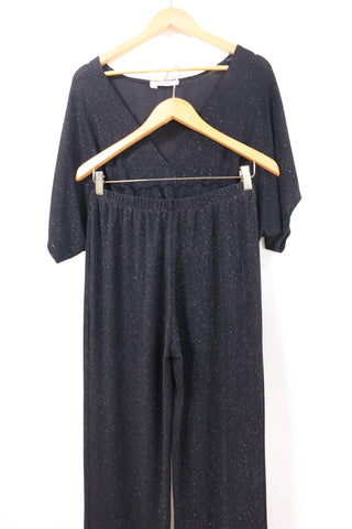 חליפת מכנסיים אלגנטית בשחור מנצנץ- L