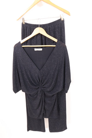 חליפת מכנסיים אלגנטית בשחור מנצנץ- L