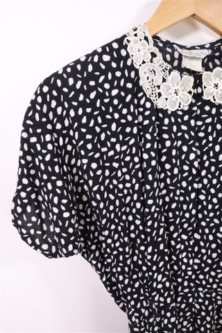 שמלת וינטיג צווארון רקום בשחור ולבן - S