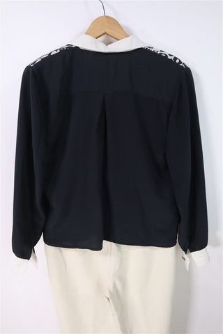 חולצת וינטיג מעוצבת בשחור ולבן- M-L