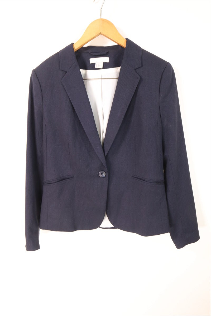 גקט אלגנטי כחול במרקם משבצות-L