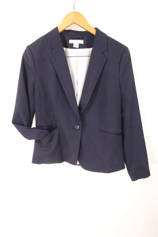 גקט אלגנטי כחול במרקם משבצות-L