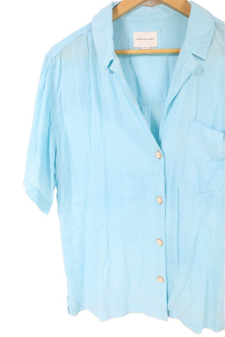 חולצה מכופתרת בתכלת- L