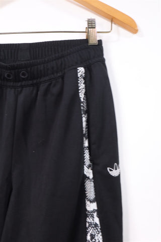 מכנסי טריקו ADIDAS מתרחבים בשחור - XS-S