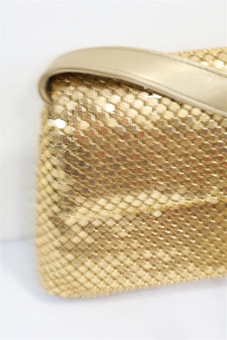 תיק וינטיג קטן וזהוב- OS