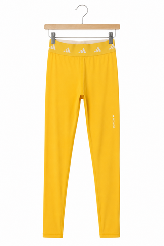 מכנסיים בפורט טייץ NIKE בצהוב- XXS-XS