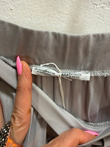 חצאית פליסה אה סימטרית  ZARA בכסף- S-L